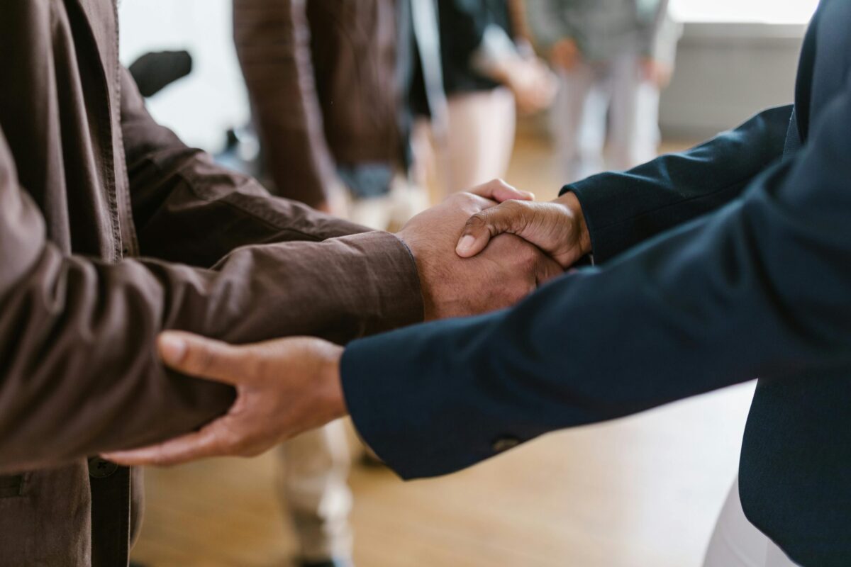 handshake between two people